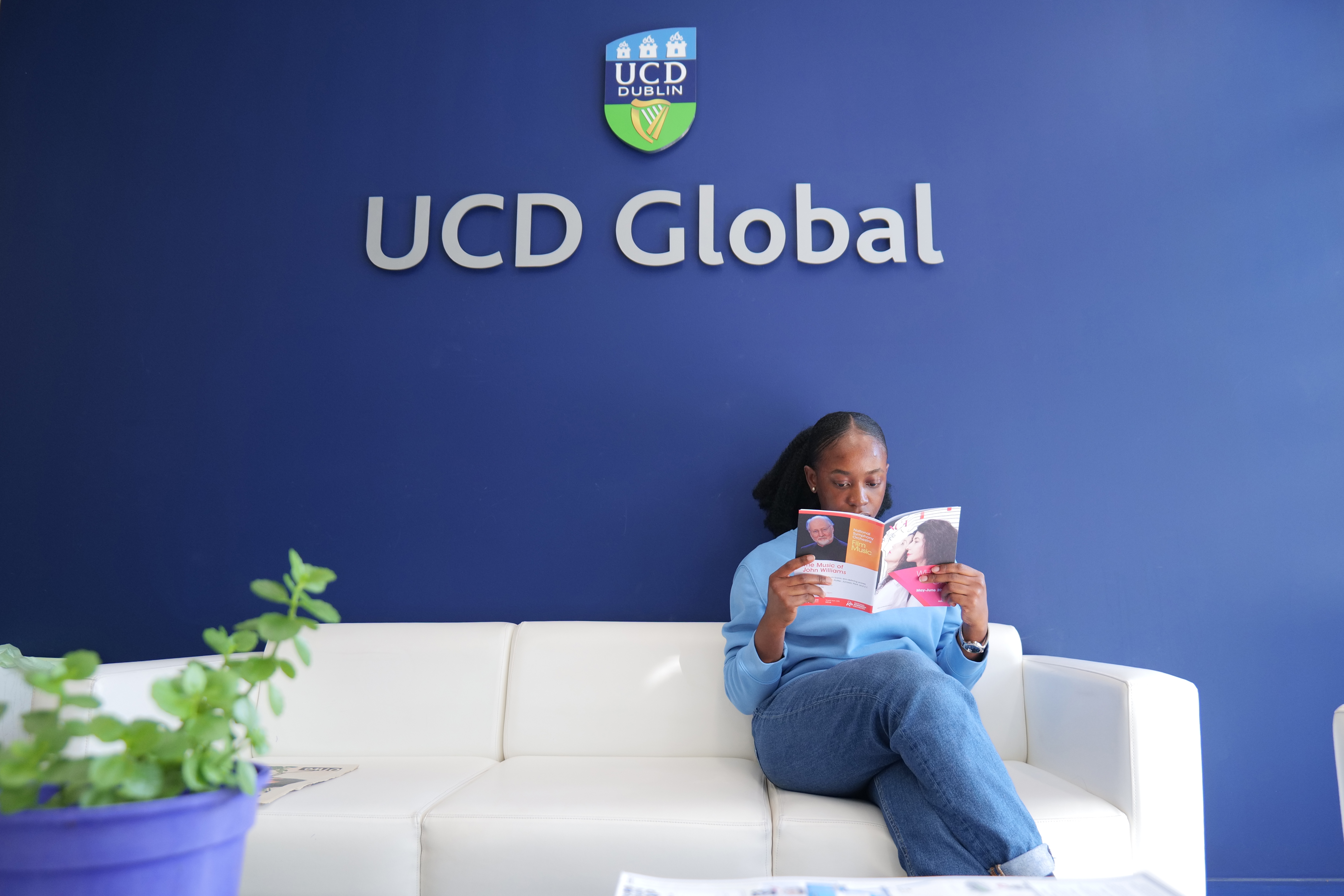 Student sitting on Global Couch